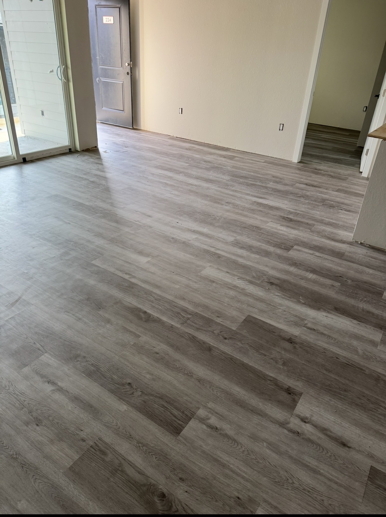 Installed grey LVP flooring